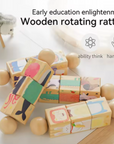 Wooden rotating baby rattle blocks with colorful printed faces and natural wood ball wheels, arranged on a light surface with promotional text and icons above.