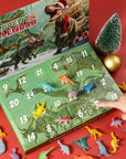 Dinosaur-themed advent calendar with small figurines on a red background