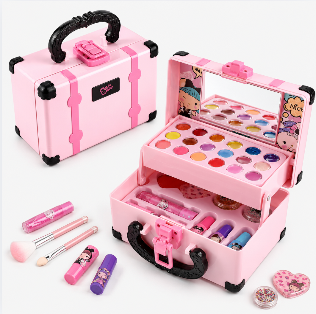 Pink toy makeup case set shown open and closed on a white background, with makeup accessories including lip gloss tubes, brushes, and small jars arranged around it.